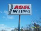Lighted plastic sign, Adel, Iowa